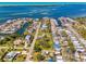 Stunning aerial view of the property with waterfront access and surrounding neighborhood amenities at 698 & West W Perry St, Englewood, FL 34223