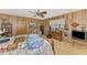 Inviting bedroom with neutral tones, wood paneled walls, and a serene atmosphere at 698 & West W Perry St, Englewood, FL 34223