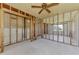 Interior view showing exposed framing and studs during a renovation project at 698 & West W Perry St, Englewood, FL 34223