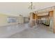 Renovated living area featuring an open-concept design with exposed framing and natural light at 698 & West W Perry St, Englewood, FL 34223