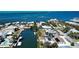 This waterfront home has a canal, pool, dock and solar panels for energy efficiency at 741 W Perry St, Englewood, FL 34223