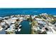 Waterfront home with a canal view, solar panels, and screened in pool at 741 W Perry St, Englewood, FL 34223