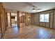 Open living space with new flooring and natural light from the windows at 741 W Perry St, Englewood, FL 34223