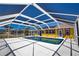 Screened-in pool with spacious deck, perfect for outdoor entertaining and backyard enjoyment at 741 W Perry St, Englewood, FL 34223