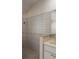 Modern bathroom with tiled shower stall, and neutral-colored walls at 7499 Clearwater St, Englewood, FL 34224