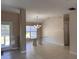 Dining room with a chandelier and view of the outdoor area through a window at 7499 Clearwater St, Englewood, FL 34224