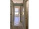 Hallway view shows the home's neutral interior palette and connects different areas at 7499 Clearwater St, Englewood, FL 34224