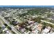 Aerial view of the property showing its location within a beautiful neighborhood near the water at 820 Bayshore Dr, Englewood, FL 34223