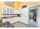 Bright kitchen with granite countertops, ample cabinet space, and modern appliances at 820 Bayshore Dr, Englewood, FL 34223