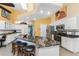 Spacious kitchen island with granite countertops and stainless steel appliances at 820 Bayshore Dr, Englewood, FL 34223
