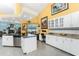 Gourmet kitchen features a center island, granite countertops, and stainless steel appliances at 820 Bayshore Dr, Englewood, FL 34223