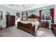 Luxurious main bedroom with a grand bed, ample natural light, and elegant decor at 820 Bayshore Dr, Englewood, FL 34223