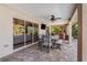 Inviting covered lanai, perfect for dining, lounging, and entertaining outdoors with a hot tub at 8251 Arlewood Cir, Port Charlotte, FL 33981