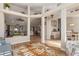 Open living area with a view of kitchen, dining, and living rooms at 8251 Arlewood Cir, Port Charlotte, FL 33981
