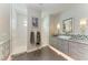Beautiful bathroom featuring modern tilework, elegant fixtures, and a sleek vanity with a vessel sink at 8304 Antwerp Cir, Port Charlotte, FL 33981