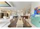 Open-concept dining and living areas with contemporary decor and plenty of natural light at 8304 Antwerp Cir, Port Charlotte, FL 33981