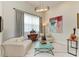 Bright living room featuring neutral furniture, modern art, and lots of natural light at 8304 Antwerp Cir, Port Charlotte, FL 33981
