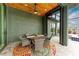 Covered patio with access to the pool and spa and interior of the home at 8304 Antwerp Cir, Port Charlotte, FL 33981