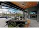 Covered patio featuring a wood ceiling and a comfortable outdoor seating area near the pool at 8304 Antwerp Cir, Port Charlotte, FL 33981