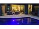 Beautiful pool and patio area with comfortable seating, perfect for outdoor entertaining and relaxation at 8304 Antwerp Cir, Port Charlotte, FL 33981