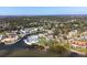 Beautiful waterfront property with lush landscaping and private boat access, ideal for boaters at 840 Park Rd, Englewood, FL 34223