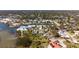 Aerial view of neighborhood highlighting canal front homes and beautiful waterways at 840 Park Rd, Englewood, FL 34223