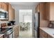 Updated kitchen with stainless steel appliances and an eat-in dining area at 840 Park Rd, Englewood, FL 34223