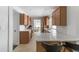Spacious kitchen featuring ample counter space, modern appliances, and stylish wooden cabinetry at 840 Park Rd, Englewood, FL 34223