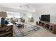 Bright living room with modern decor and lots of natural light at 840 Park Rd, Englewood, FL 34223