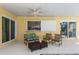 The patio is covered with a ceiling fan, making it a great place to relax and enjoy the outdoors at 840 Park Rd, Englewood, FL 34223