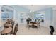 Cozy breakfast nook with waterfront views and elegant furnishings at 9325 Saint Paul Dr, Port Charlotte, FL 33981