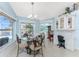 Dining area with beautiful water views, white trim, and a built-in desk area at 9325 Saint Paul Dr, Port Charlotte, FL 33981