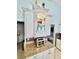Granite counters and white glass cabinet display dishes and glassware in the kitchen at 9325 Saint Paul Dr, Port Charlotte, FL 33981