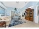 Spacious living room featuring stylish furnishings, tile flooring, and a view of the outdoor pool at 9325 Saint Paul Dr, Port Charlotte, FL 33981