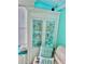 Living Room features custom built-in shelving, and lots of natural light at 9325 Saint Paul Dr, Port Charlotte, FL 33981