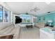 Living room with beautiful water views, lots of natural light, and comfortable furniture at 9325 Saint Paul Dr, Port Charlotte, FL 33981