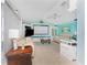 Cozy living room with large projector screen and beautiful coastal decor at 9325 Saint Paul Dr, Port Charlotte, FL 33981