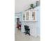 Home office features custom cabinetry, decorative shelving and desk space at 9325 Saint Paul Dr, Port Charlotte, FL 33981