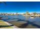 Scenic waterfront view of the canal with docks and beautiful landscaping, offering a serene ambiance at 9325 Saint Paul Dr, Port Charlotte, FL 33981