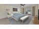 Serene bedroom with a pool view, neutral decor, and comfortable furnishings for relaxation at 977 N Doral Ln, Venice, FL 34293