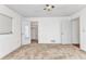 Bedroom featuring carpet, ceiling fan, closet with shelving, and a window for natural light at 977 N Doral Ln, Venice, FL 34293