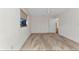 Inviting bedroom featuring neutral carpet, a window, and ample natural light at 977 N Doral Ln, Venice, FL 34293