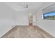 Bedroom featuring plush carpet, a ceiling fan, a window and closet at 977 N Doral Ln, Venice, FL 34293