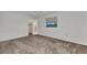 Cozy bedroom with plush carpeting, window, and closet at 977 N Doral Ln, Venice, FL 34293