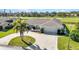 Attractive home with a well-kept yard and circular driveway at 977 N Doral Ln, Venice, FL 34293