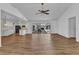 Open floor plan showcasing a seamless flow between the kitchen, living room, and outdoor pool area at 977 N Doral Ln, Venice, FL 34293