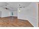 Spacious living room with vaulted ceilings, modern flooring, and lots of natural light at 977 N Doral Ln, Venice, FL 34293