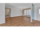 Bright living area showcasing new floors and a decorative glass wall feature at 977 N Doral Ln, Venice, FL 34293