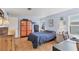 Cozy bedroom featuring comfortable bed, ample storage, and a functional workspace perfect for restful nights and productivity at 985 Jolanda Cir, Venice, FL 34285
