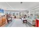 Open living room with large windows offering plenty of natural light at 985 Jolanda Cir, Venice, FL 34285